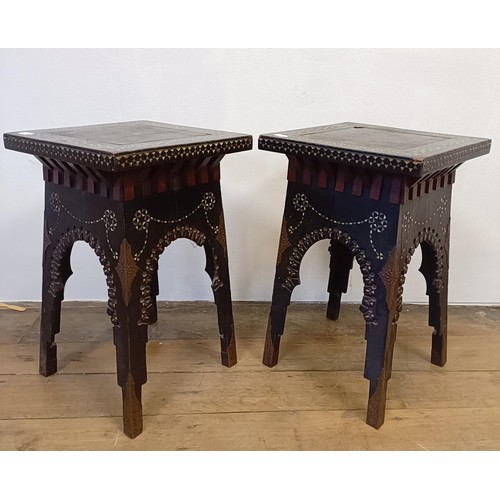 1319 - A pair of early 20th century ebony pedestals, with geometric inlay and pierced decoration, 32 cm wid... 