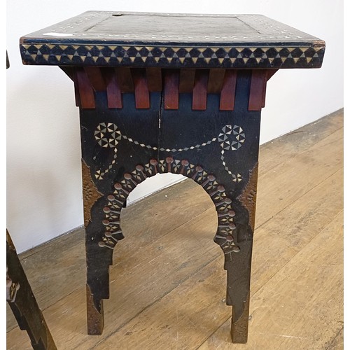 1319 - A pair of early 20th century ebony pedestals, with geometric inlay and pierced decoration, 32 cm wid... 