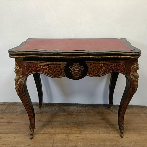 1292 - An early 20th century Boulle folding card table, with a replaced leather top, 85 cm wide