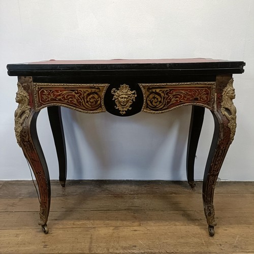 1292 - An early 20th century Boulle folding card table, with a replaced leather top, 85 cm wide