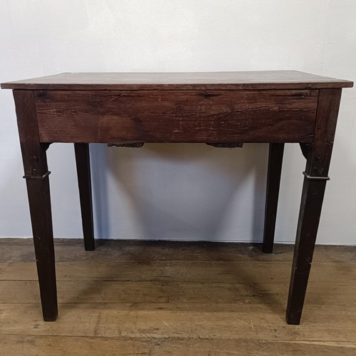 1293 - An oak lowboy, having a four drawer configuration, 68 cm wide