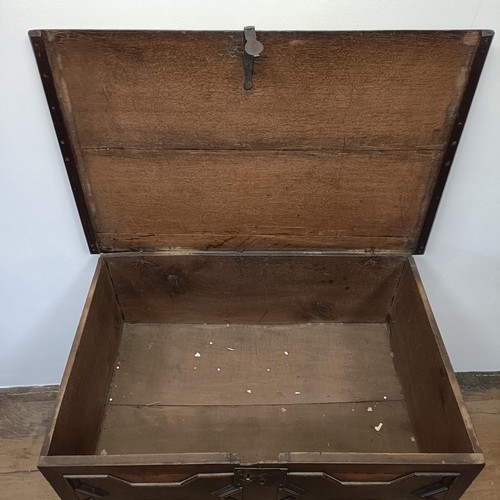 1294 - An oak box, with a hinged top, on a stand, 93 cm wide