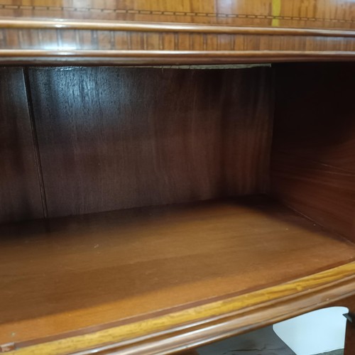 1300 - An early 20th century satinwood bow front display cabinet, 173 cm high x 116 cm wide