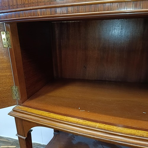 1300 - An early 20th century satinwood bow front display cabinet, 173 cm high x 116 cm wide