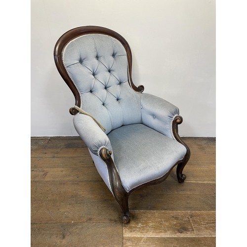 1257 - A Victorian mahogany framed button back armchair, and another similar (2)