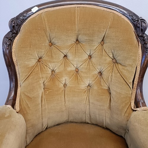 1259 - A 19th century walnut framed button back armchair