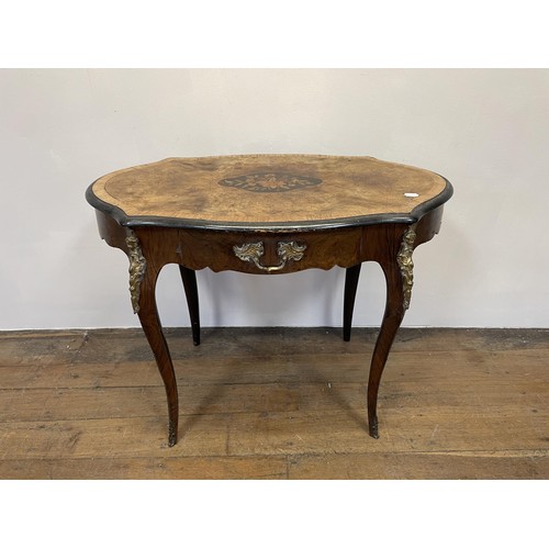 1309 - A French walnut serpentine table, with a single freeze drawer, with gilt metal mounts, 90 cm wide