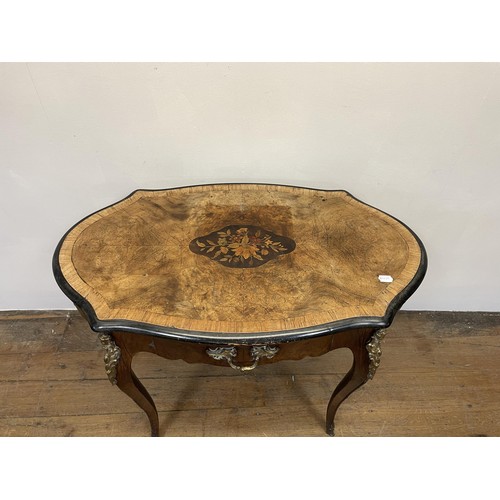 1309 - A French walnut serpentine table, with a single freeze drawer, with gilt metal mounts, 90 cm wide