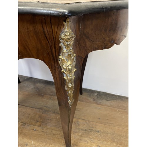 1309 - A French walnut serpentine table, with a single freeze drawer, with gilt metal mounts, 90 cm wide