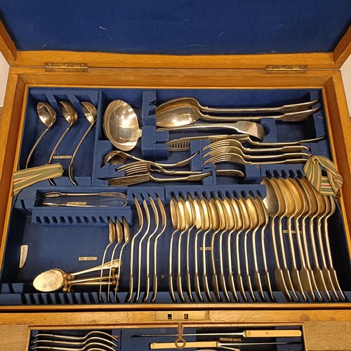 168 - A canteen of cutlery, in an oak case, with a four piece tea service