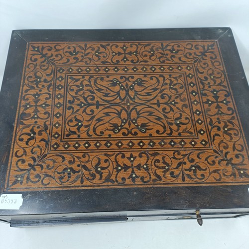 1288 - A 19th century Indo-Portuguese table top box, with inlaid decoration, having one long drawer and two... 