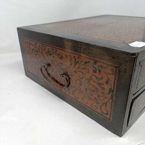 1288 - A 19th century Indo-Portuguese table top box, with inlaid decoration, having one long drawer and two... 