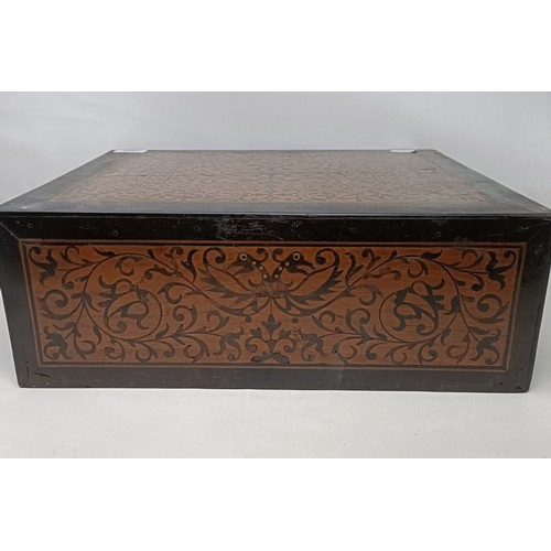 1288 - A 19th century Indo-Portuguese table top box, with inlaid decoration, having one long drawer and two... 