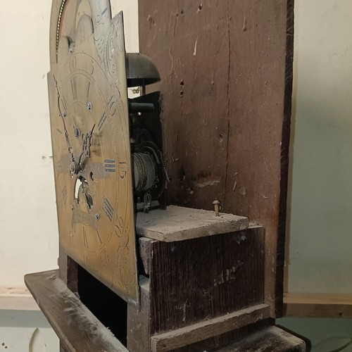 1284 - A longcase clock, with a brass dial, subsidiary date and seconds dial, and a painted moon phase dial... 