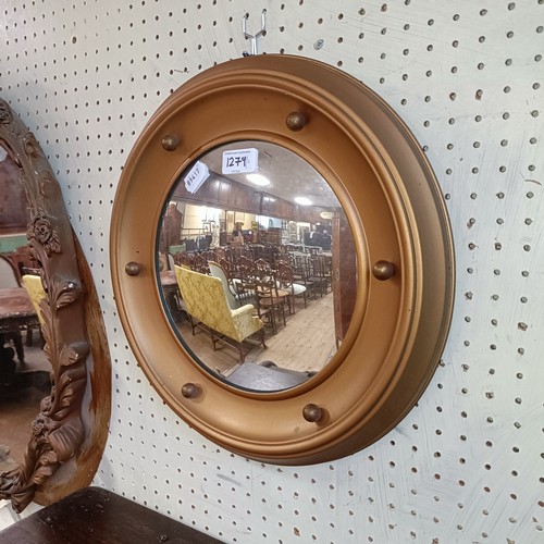 1279 - A gilt framed convex wall mirror, 38 cm diameter, and a wall mirror (2)