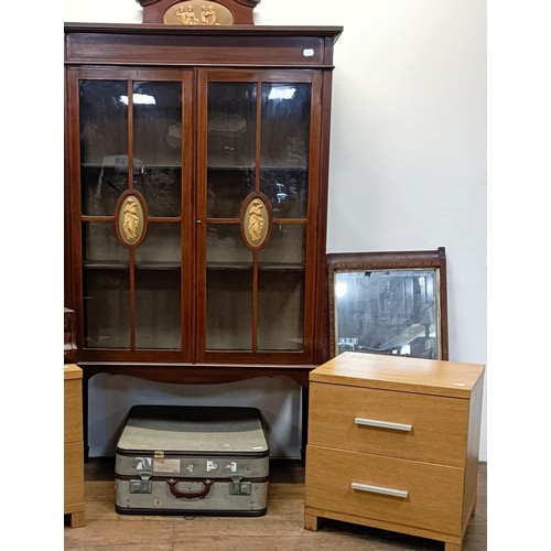 1301 - A mahogany display cabinet, 92 cm wide, a pair of two drawer chests, a trunk, a mirror and a sideboa... 