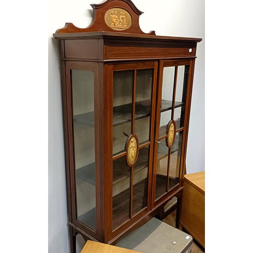 1301 - A mahogany display cabinet, 92 cm wide, a pair of two drawer chests, a trunk, a mirror and a sideboa... 