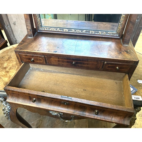 1310 - A 19th century walnut and gilt gesso bedroom mirror, the base having four drawers, 79 x 44 cm