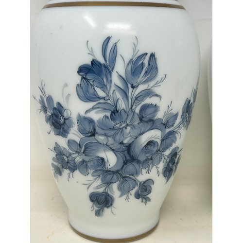 1095 - A pair of glass faux Delft vases, decorated flowers, 32 cm high (2)