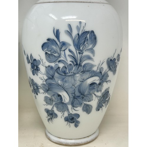 1095 - A pair of glass faux Delft vases, decorated flowers, 32 cm high (2)