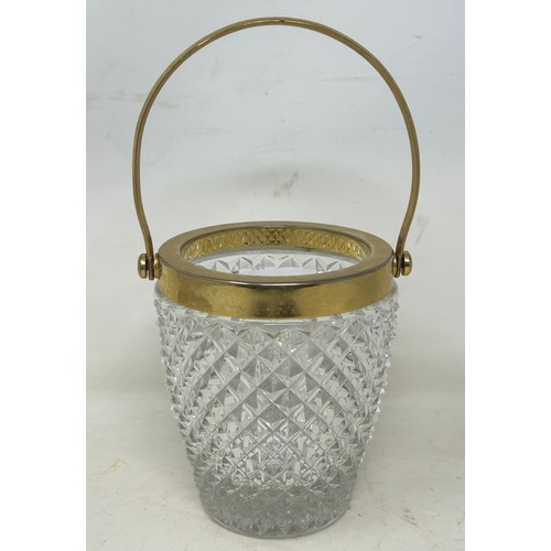 1096 - A cut glass ice bucket, with gilt metal mounts, 26 cm high