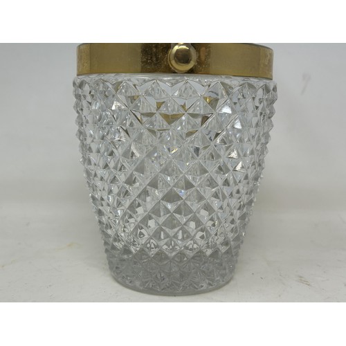 1096 - A cut glass ice bucket, with gilt metal mounts, 26 cm high