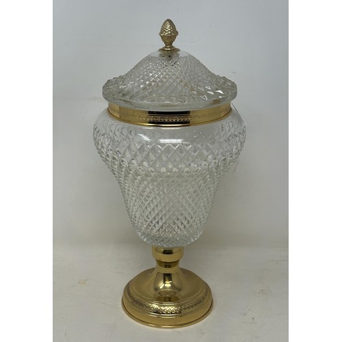 1097 - A cut glass vase and cover, with gilt metal mounts, 31 cm high