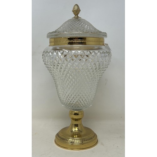 1097 - A cut glass vase and cover, with gilt metal mounts, 31 cm high