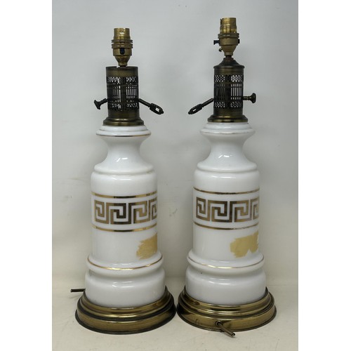 1098 - A pair of glass lamps, with Greek key decoration, with gilt metal mounts, 48 cm high (2)