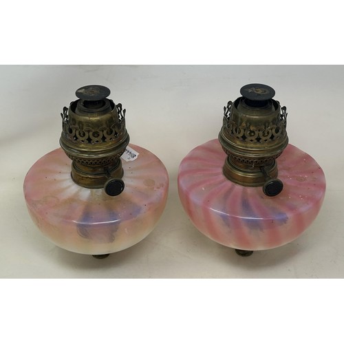 1099 - A pair of Vaseline glass oil lamp reservoirs, 17 cm diameter (2)