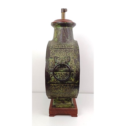 1057 - A Chinese lamp base, 56 cm high