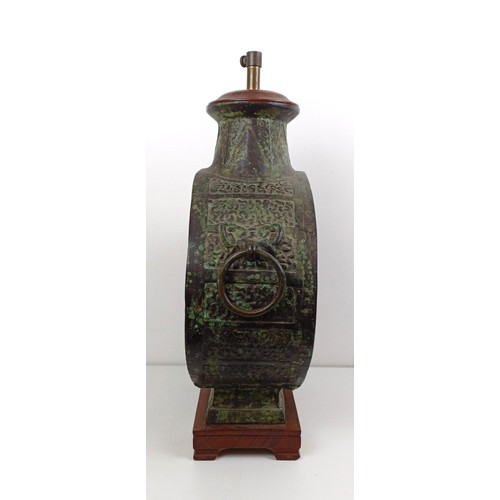 1057 - A Chinese lamp base, 56 cm high