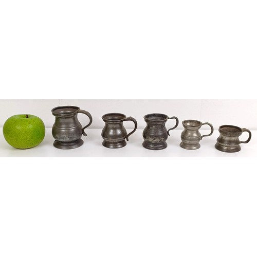 1079 - A graduated set of pewter mugs, and assorted other items (2 boxes)