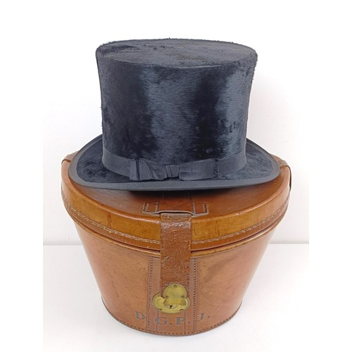 1086 - A gentleman's moleskin top hat by Christy's of London, in a fitted leather box