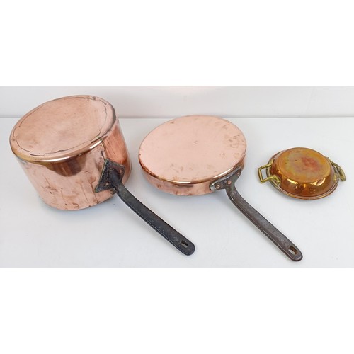 1182 - A copper pan with an iron handle, another and a two handled pan (3)