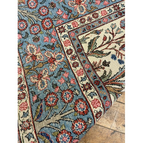 1236 - A Persian cream ground rug, 205 x 142 cm