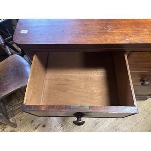 1199 - A mahogany chest, having two short and three long drawers, 106 cm wide