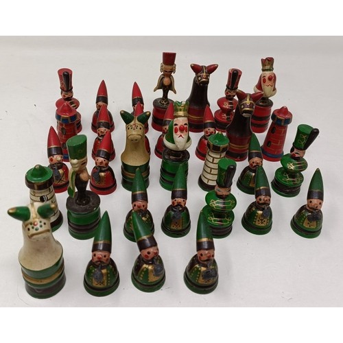 1029 - A novelty carved wood and painted chess set, the king 8 cm high