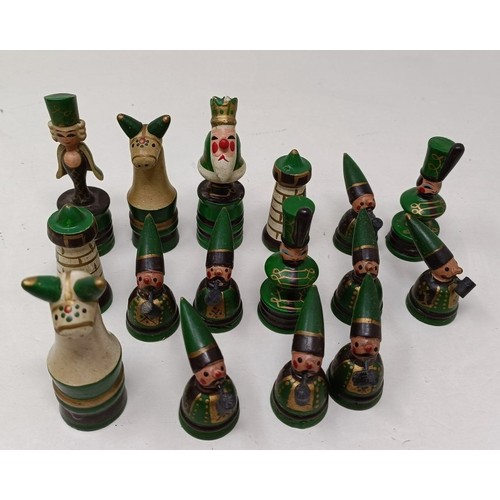 1029 - A novelty carved wood and painted chess set, the king 8 cm high