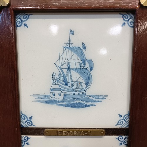 1006 - Twelve Delft tiles, decorated ships, in two mahogany frames, 89 x 20 cm (2)