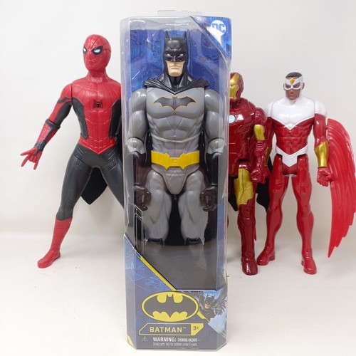 127 - A Batman figure, assorted film related toys and models, and three comic book prints (qty)