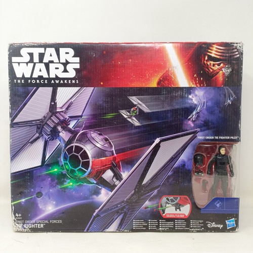 129 - A large Star Wars Chewbacca model, 52 cm, a storm trooper and assorted Star Wars games, memorabilia ... 