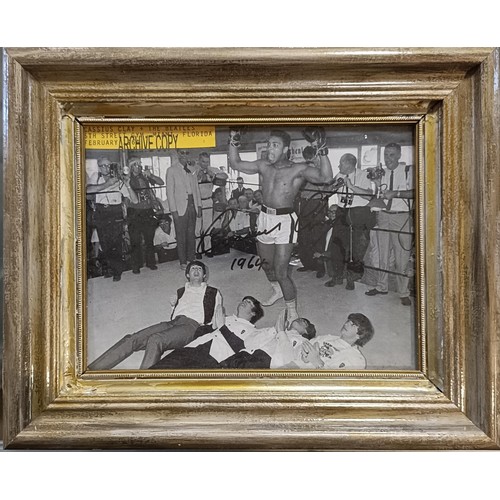 136 - Cassius Clay and the Beatles, signed, photograph dated 1964, 27 x 22 cm, label versoProvenance: Cons... 