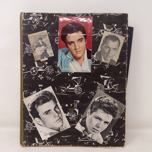 126 - A scrapbook album of the stars, to include Elvis Presley and Cliff Richard, some signed