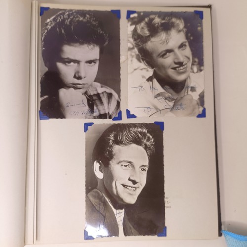 126 - A scrapbook album of the stars, to include Elvis Presley and Cliff Richard, some signed