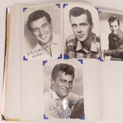 126 - A scrapbook album of the stars, to include Elvis Presley and Cliff Richard, some signed