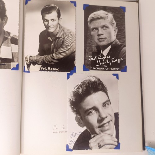 126 - A scrapbook album of the stars, to include Elvis Presley and Cliff Richard, some signed