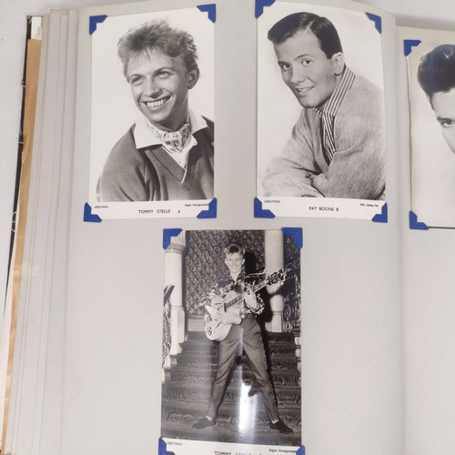 126 - A scrapbook album of the stars, to include Elvis Presley and Cliff Richard, some signed