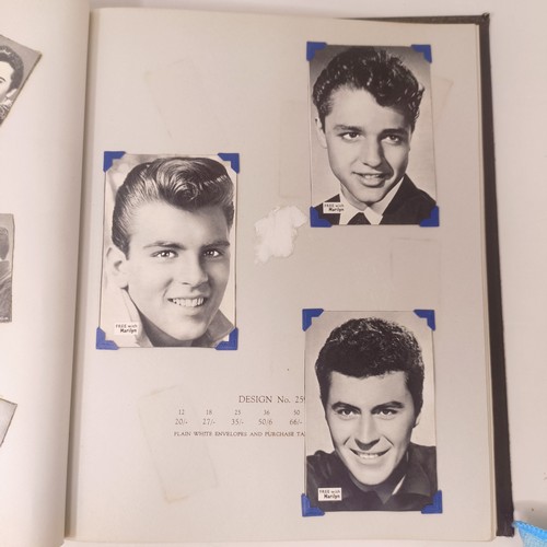 126 - A scrapbook album of the stars, to include Elvis Presley and Cliff Richard, some signed