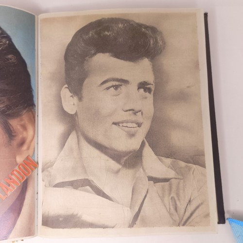 126 - A scrapbook album of the stars, to include Elvis Presley and Cliff Richard, some signed